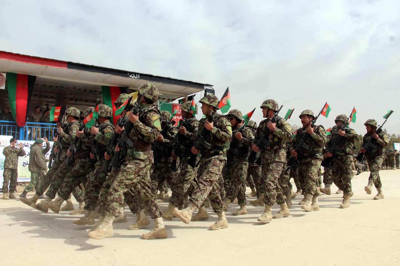 Afghan soldiers celebrate the Soldiers Day in Kandahar, Afghanistan.