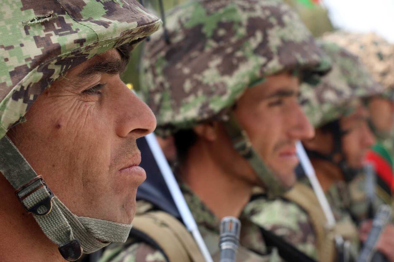 Afghan soldiers celebrate the Soldiers Day in Kandahar, Afghanistan.