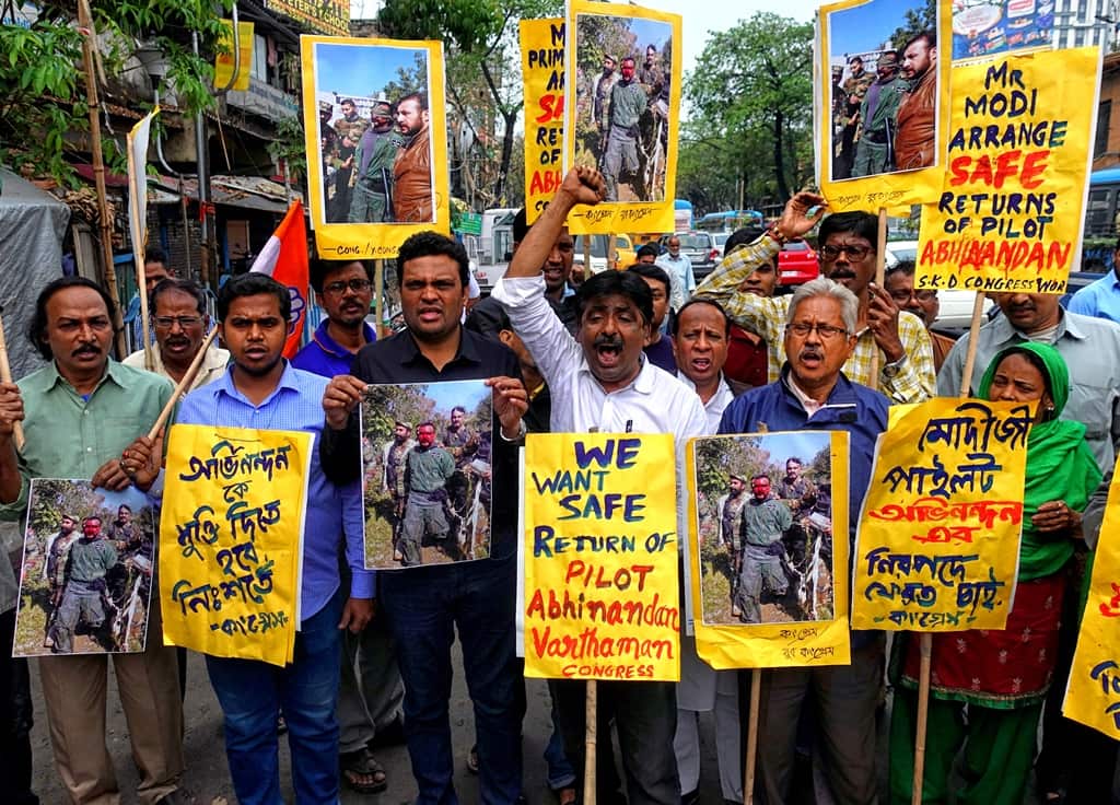 Activists of Indian National Congress are seen shouting slogans while holding placards demanding a safe return of the air force Pilot Abhinandan Vardaman