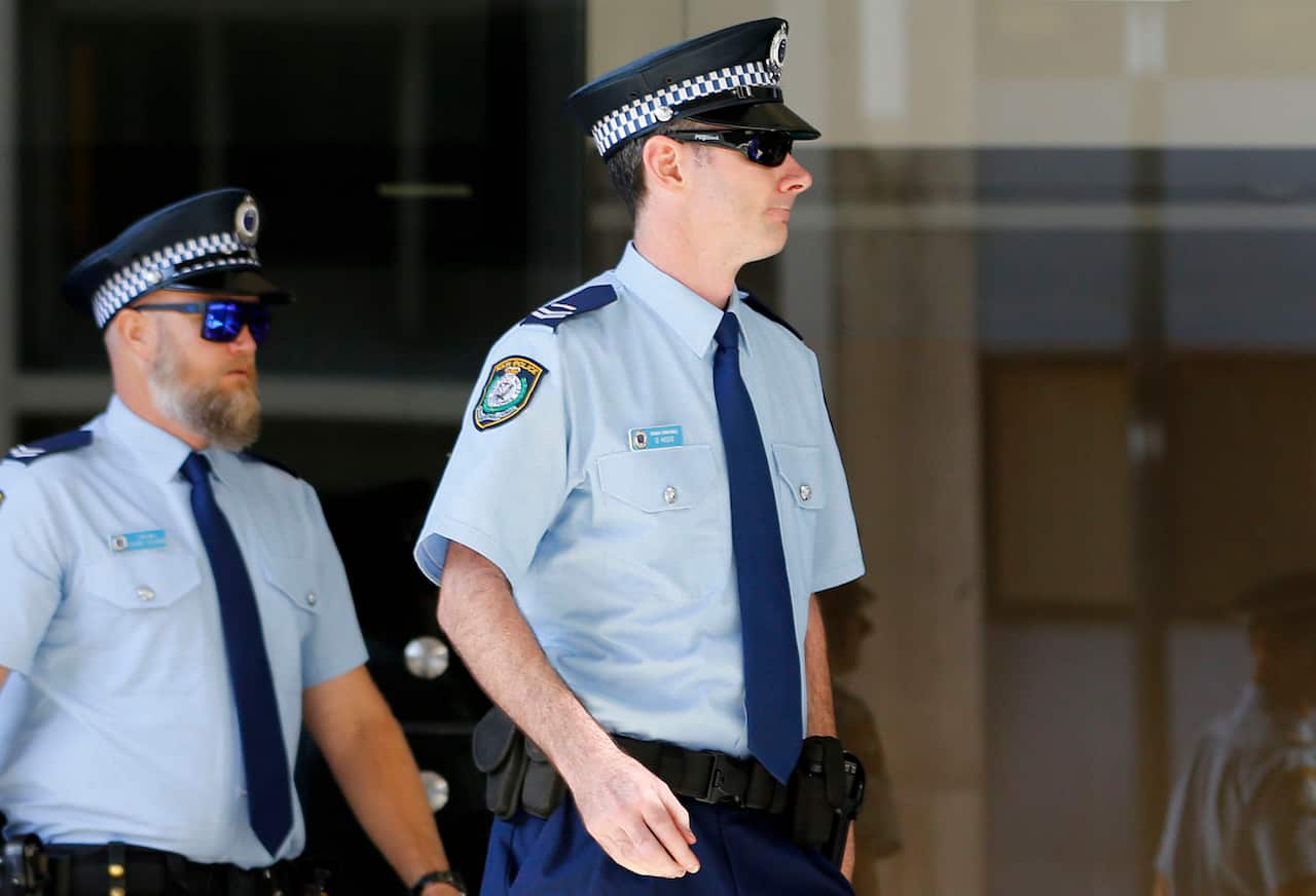 Acting Sergeant Gregory Hosie arrive at Newcastle Court for the inquest into the police custody death of Rebecca Lyn Maher.