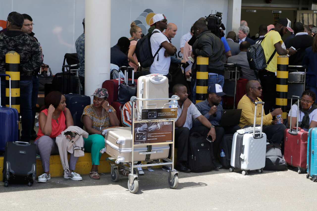 Stranded passengers waiting for their flights out of JKIA airport today in Nairobi, Kenya.