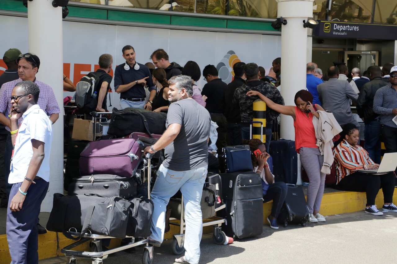 Stranded passengers waiting for their flights out of JKIA airport today in Nairobi, Kenya.