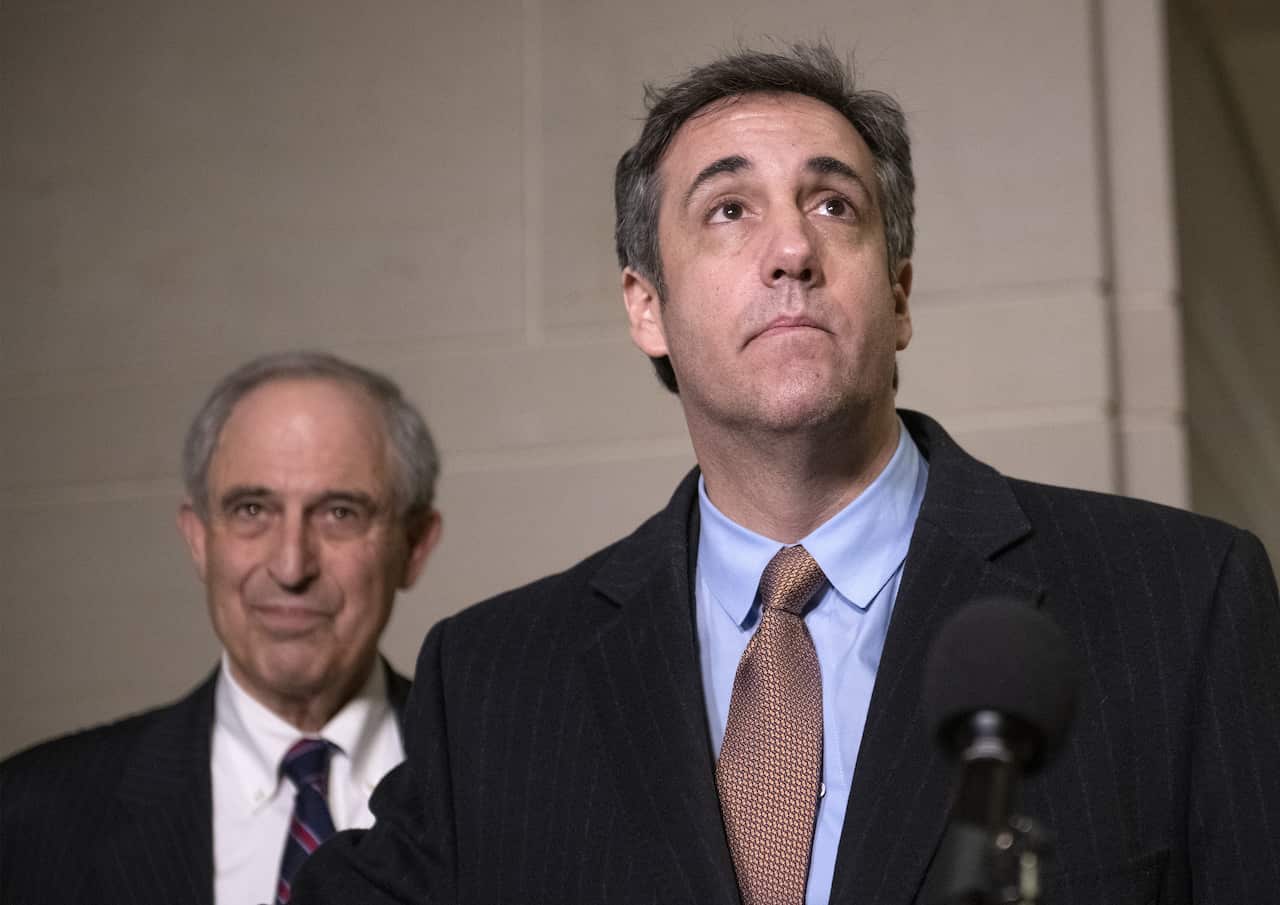 Michael Cohen, makes a statement as he departs after giving testimony in Washington, DC.