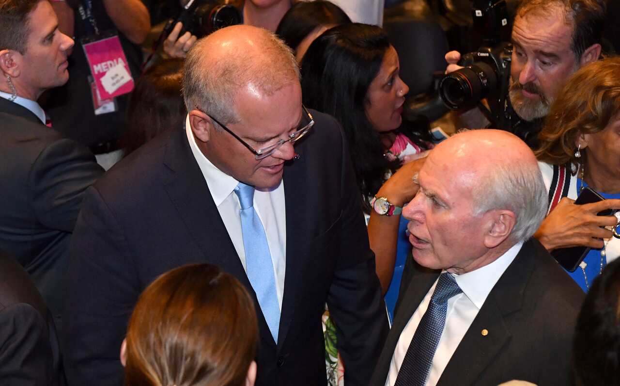 Prime Minister Scott Morrison and former prime minister John Howard at the NSW Liberal Campaign Launch at Penrith Panthers Leagues Club in Sydney, Sunday.