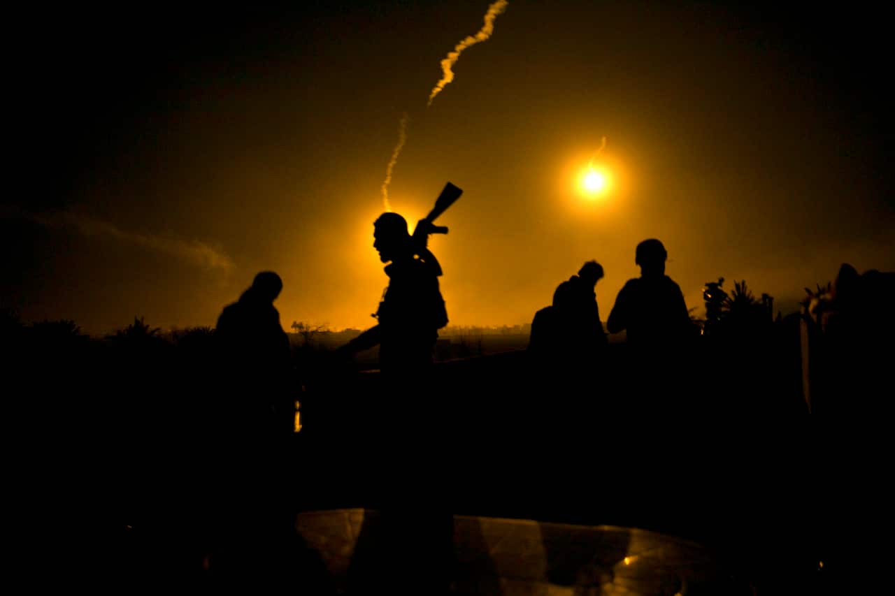 US-backed Syrian Democratic Forces (SDF) fighters in Baghouz, Syria. IS has effectively been defeated by a coalition of allies.