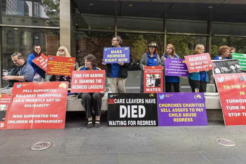 Protesters outside the County Court in Melbourne.