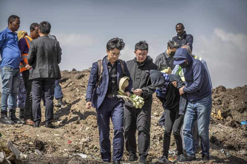 Chinese relatives of victims who died in the crash visit and grieve