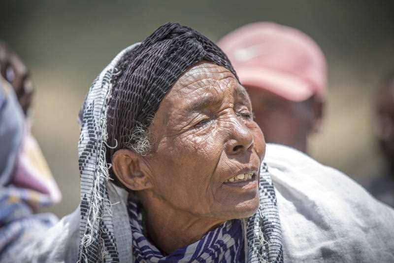 A family member reacts at the scene