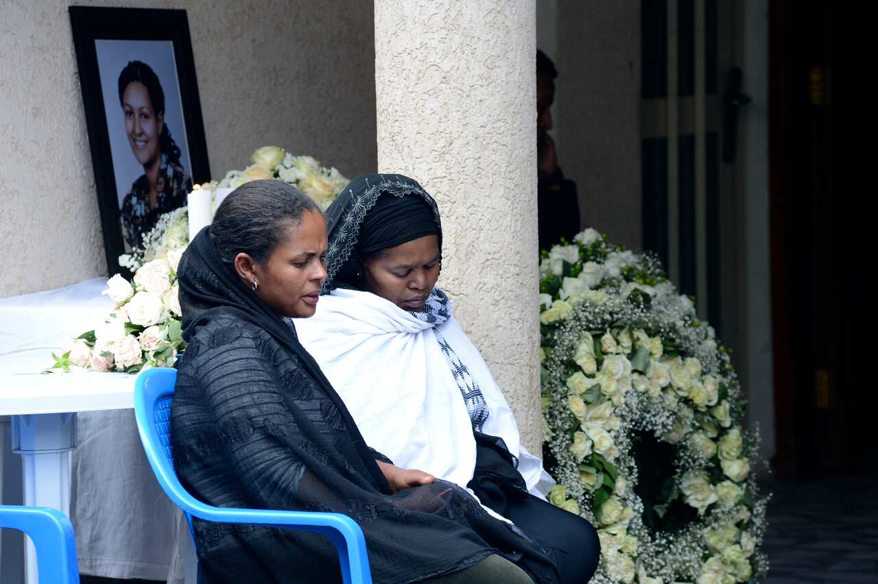 Family members mourn forf crash victim air hostess Sara Gebremichael, 38, at her house in Addis Ababa, Ethiopia.