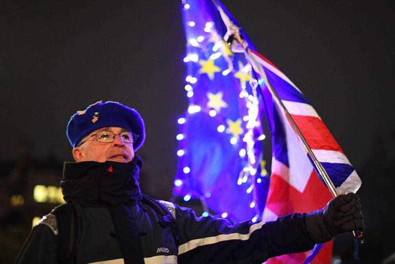 A demonstrator on College Green in Westminster, London