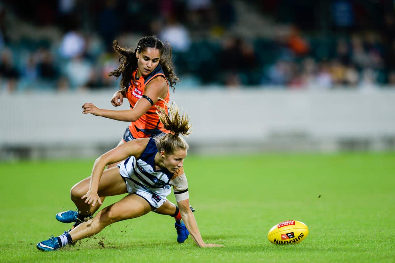 Sophie Van De Heuvel of the Cats and Haneen Zreika of the Giants during the Round 7 AFLW match between the GWS Giants and the Geelong Cats at UNSW Canberra Oval in Canberra, Friday, March 15, 2019. (AAP Image/Rohan Thomson) NO ARCHIVING, EDITORIAL USE ONL