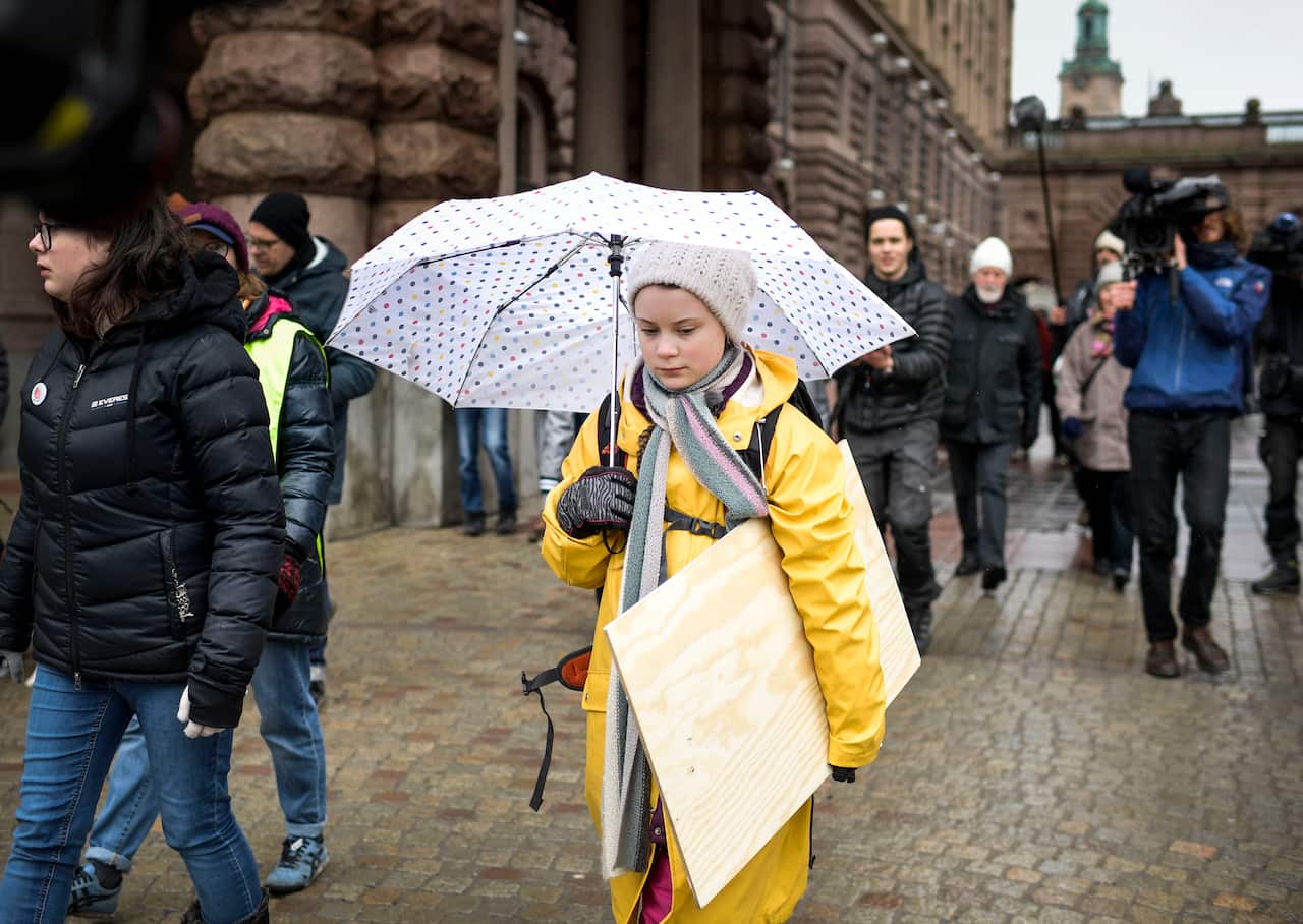 Protesters and activist Greta Thunberg participate in the global demonstration "Global strike for future" in central Stockholm Sweden, 15th March, 2019