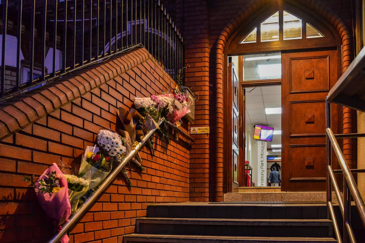 Flowers attached to the railings of Finsbury Park Mosque in London.