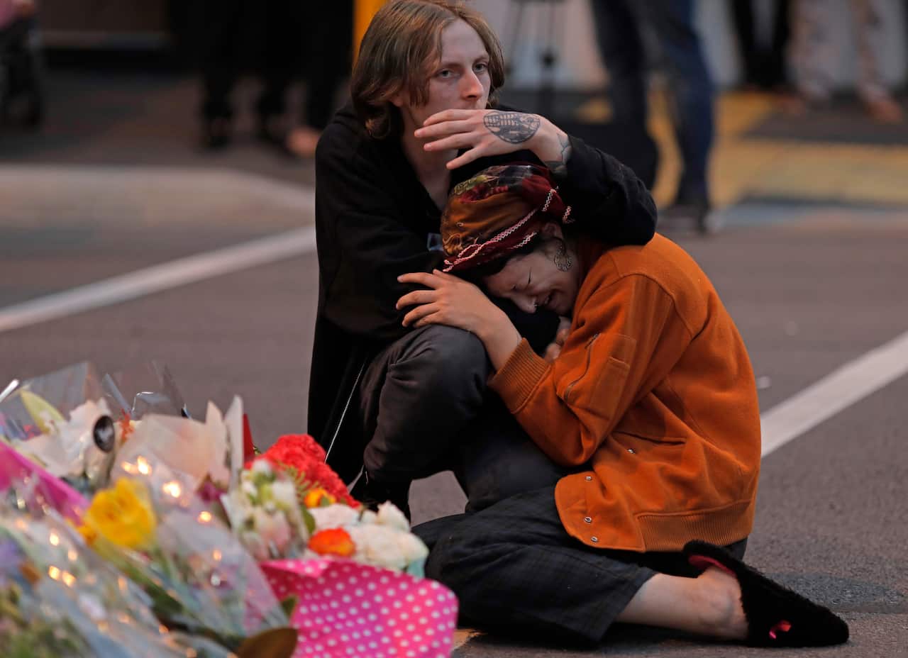 Mourners paying their respects at a makeshift memorial near the Masjid Al Noor mosque in Christchurch, New Zealand.