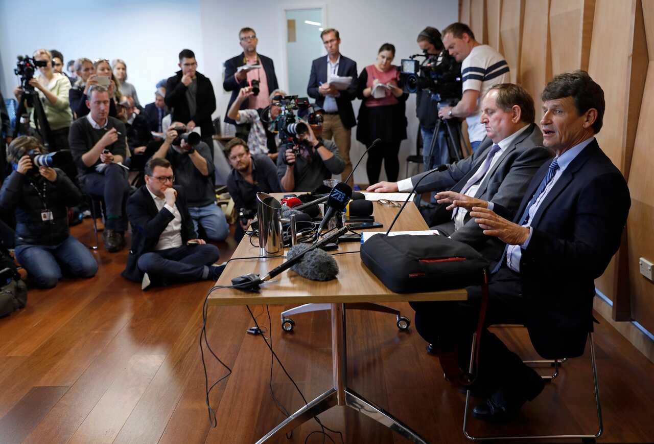 David Tipple, right, Managing Director of Gun City Ltd gestures during a press conference in Christchurch, New Zealand.