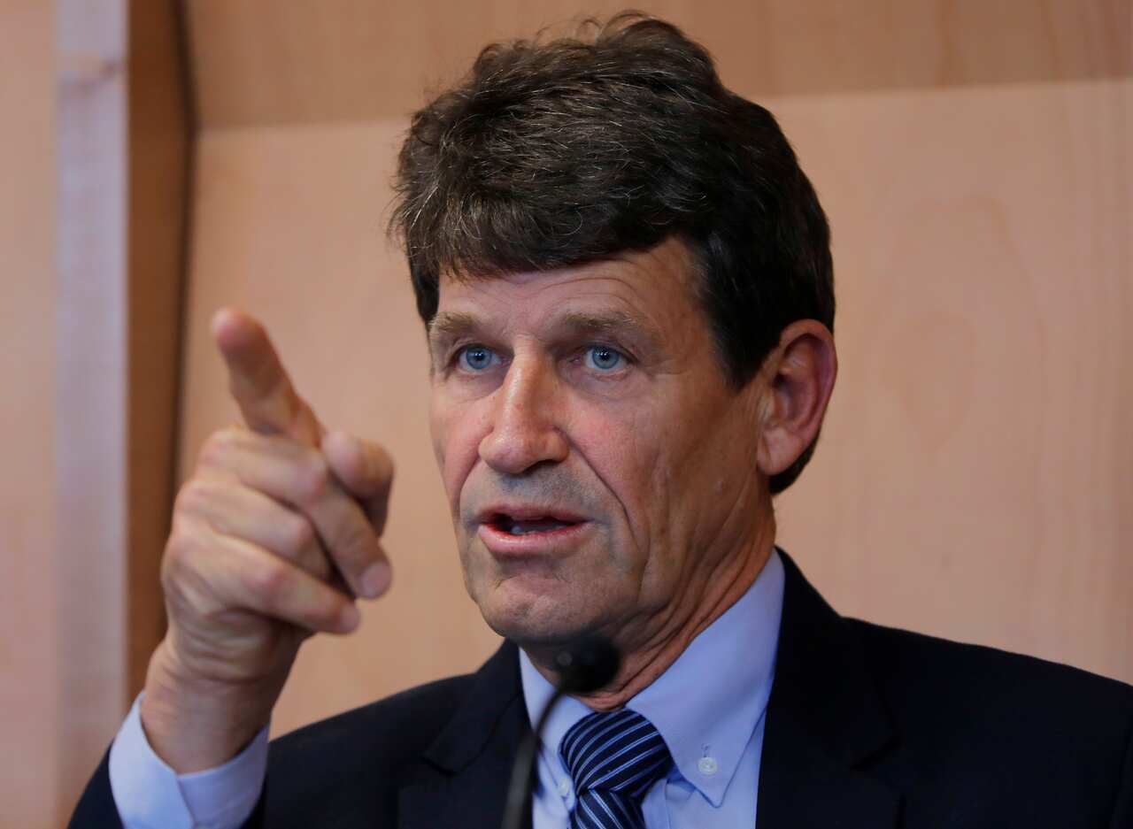 David Tipple, Managing Director of Gun City Ltd gestures during a press conference in Christchurch, New Zealand.