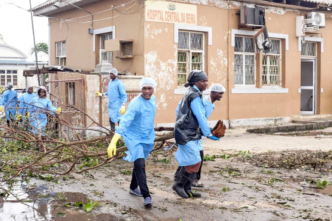 Nurses of Beira Central Hospital help to clean the streets of debris after the passage of the cyclone Idai in Beira City.