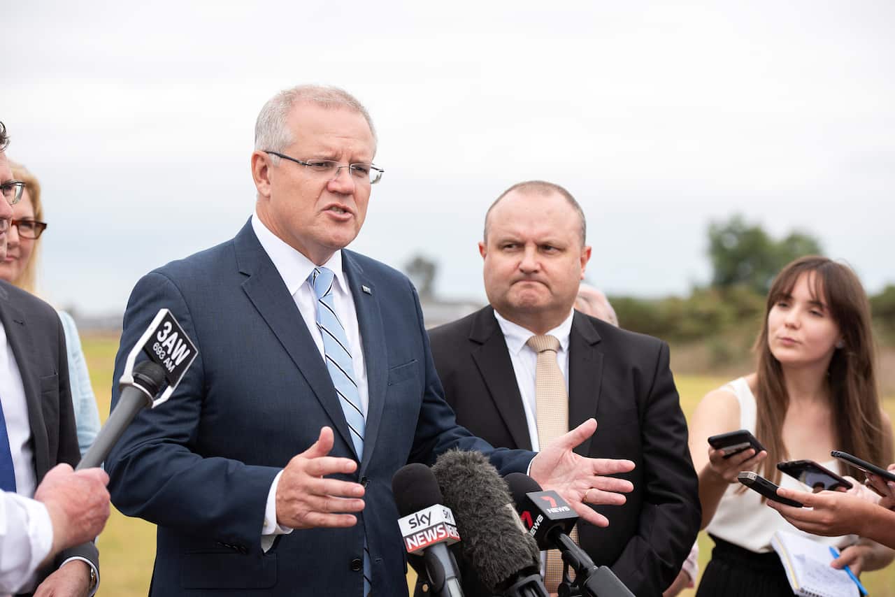 Prime Minister Scott Morrison (left) and Liberal Member for La Trobe Jason Wood are seen during an announcement in Melbourne, Thursday, March 21, 2019. (AAP Image/Ellen Smith) NO ARCHIVING