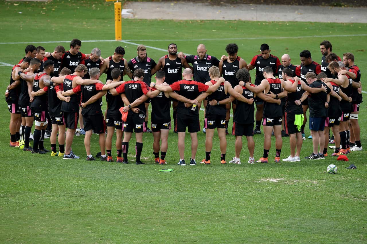 Canterbury Crusaders players and staff pause for two minute's silence, a week on from the Christchurch terror attack.