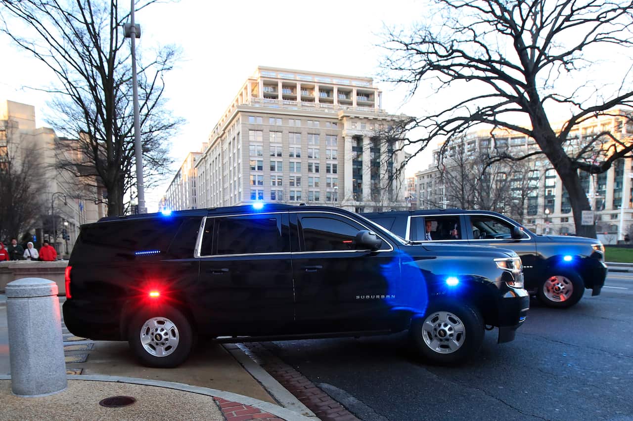 Attorney General William Barr, leaves the Department of Justice building in Washington.