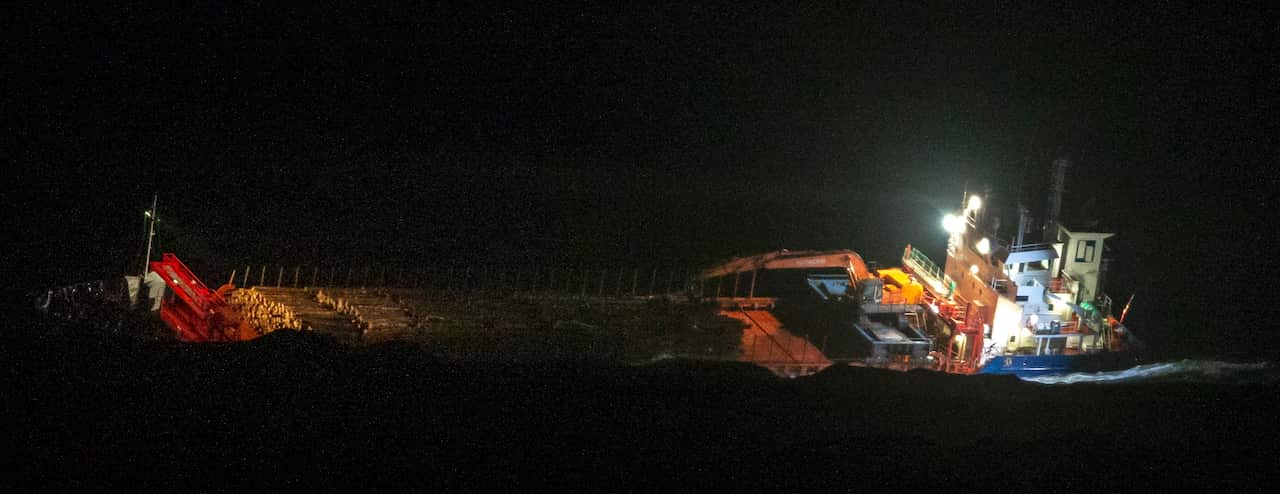 A view of the Norwegian cargo vessel Hagland Captain in trouble with it's engine, and the crew rescued by helicopter off the west coast of Norway.