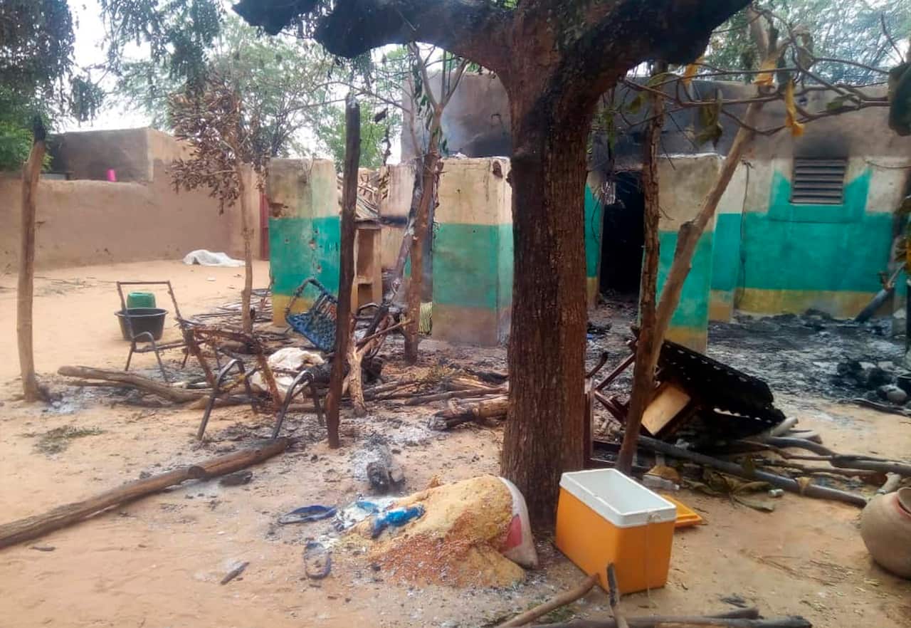 The scene shortly after a violent attack which left about 160 people dead at Ogossogou village in Mali.