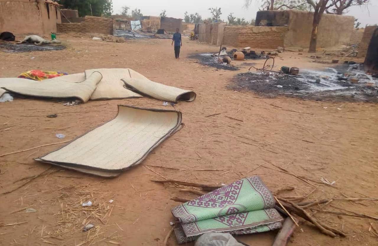 The scene shortly after a violent attack that left at least 134 people dead and dozens more wounded in a Mali village. 