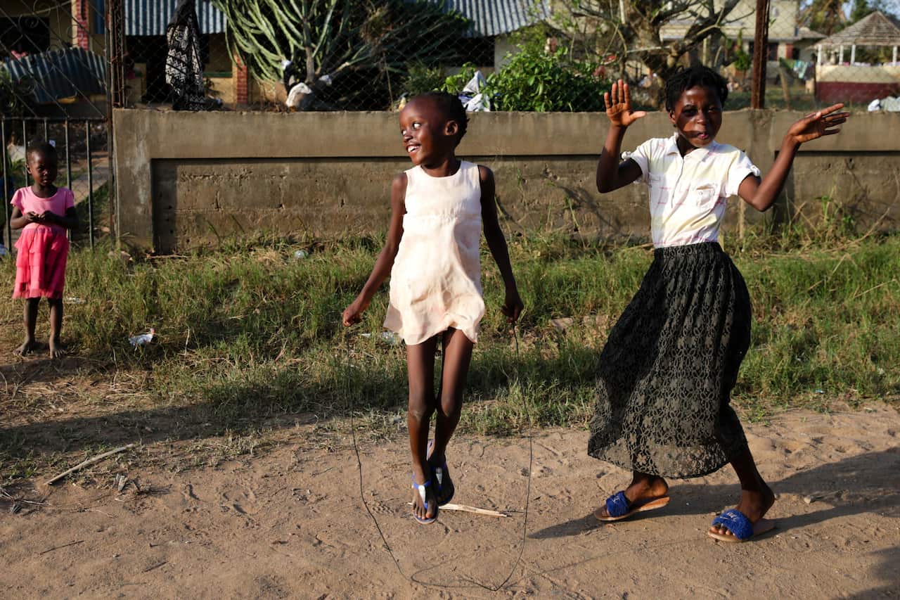 Children play in the village of Buzi, after the passage of cyclone Idai, in the province of Sofala, central Mozambique, March  27 2019. 
