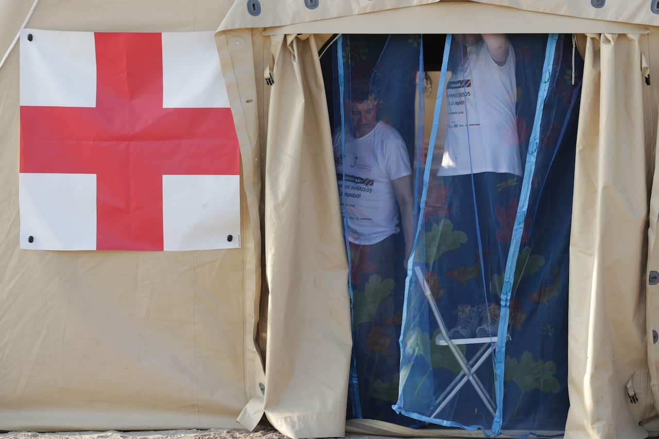 Members of the Portuguese Red Cross build a makeshift hospital amid reports that 1.7 million people are said to be affected across southern Africa.
