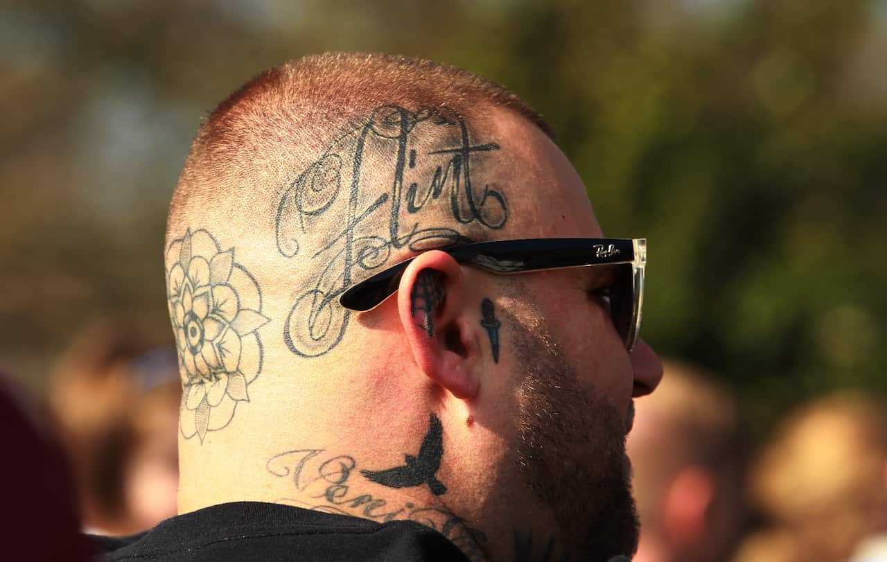 People attend the funeral of Prodigy band member Keith Flint in Essex, Britain