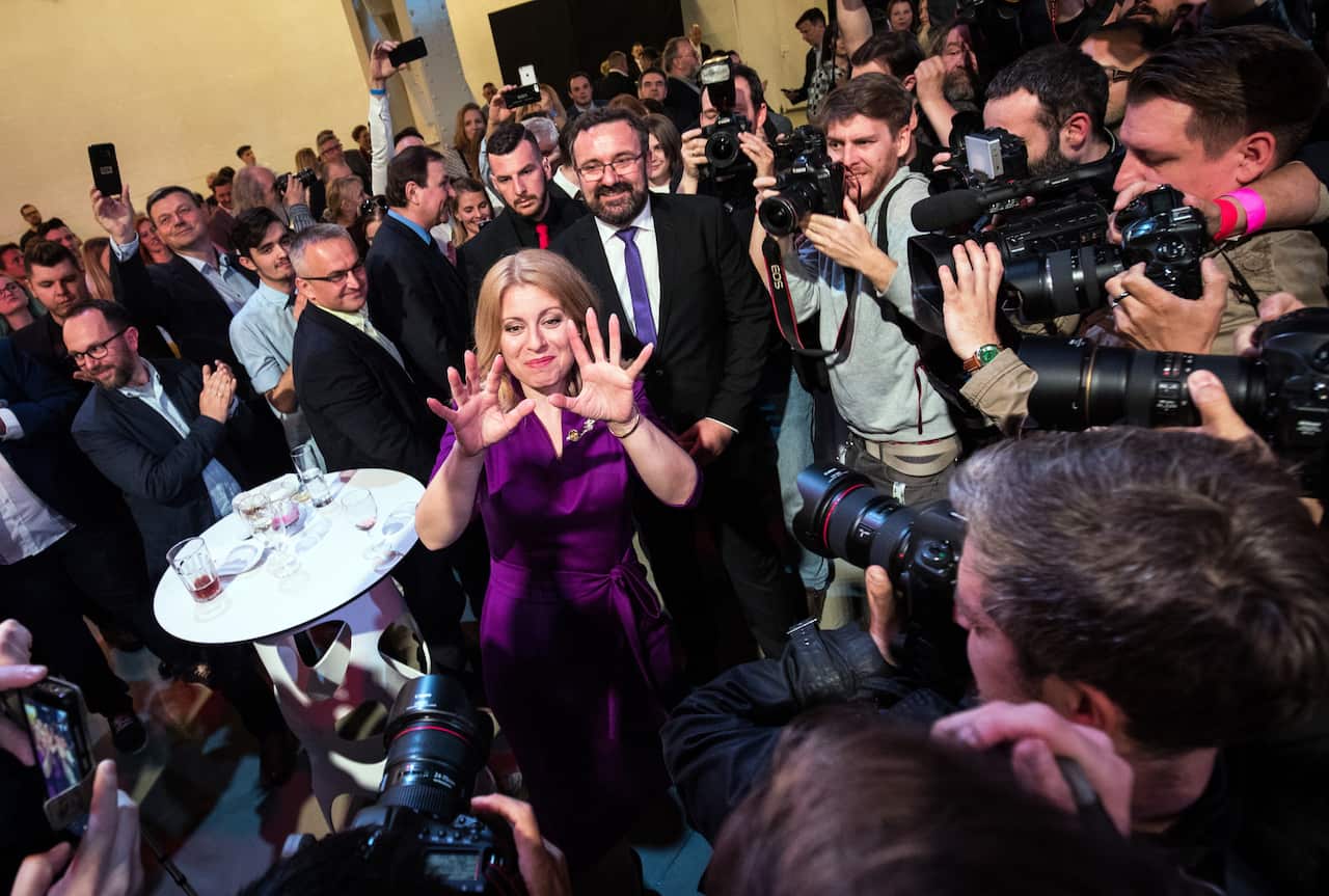 Zuzana Caputova reacts as she waits for the results at her election.