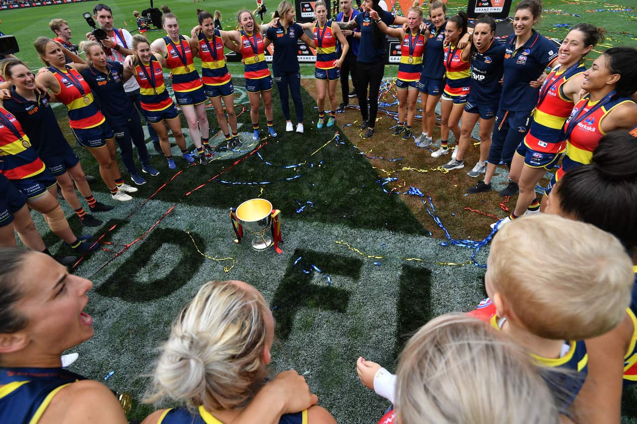 Crows players celebrate after the AFLW Grand Final match between the Adelaide Crows and Carlton Blues at the Adelaide Oval, Adelaide, Sunday, March 31, 2019. (AAP Image/David Mariuz) NO ARCHIVING, EDITORIAL USE ONLY