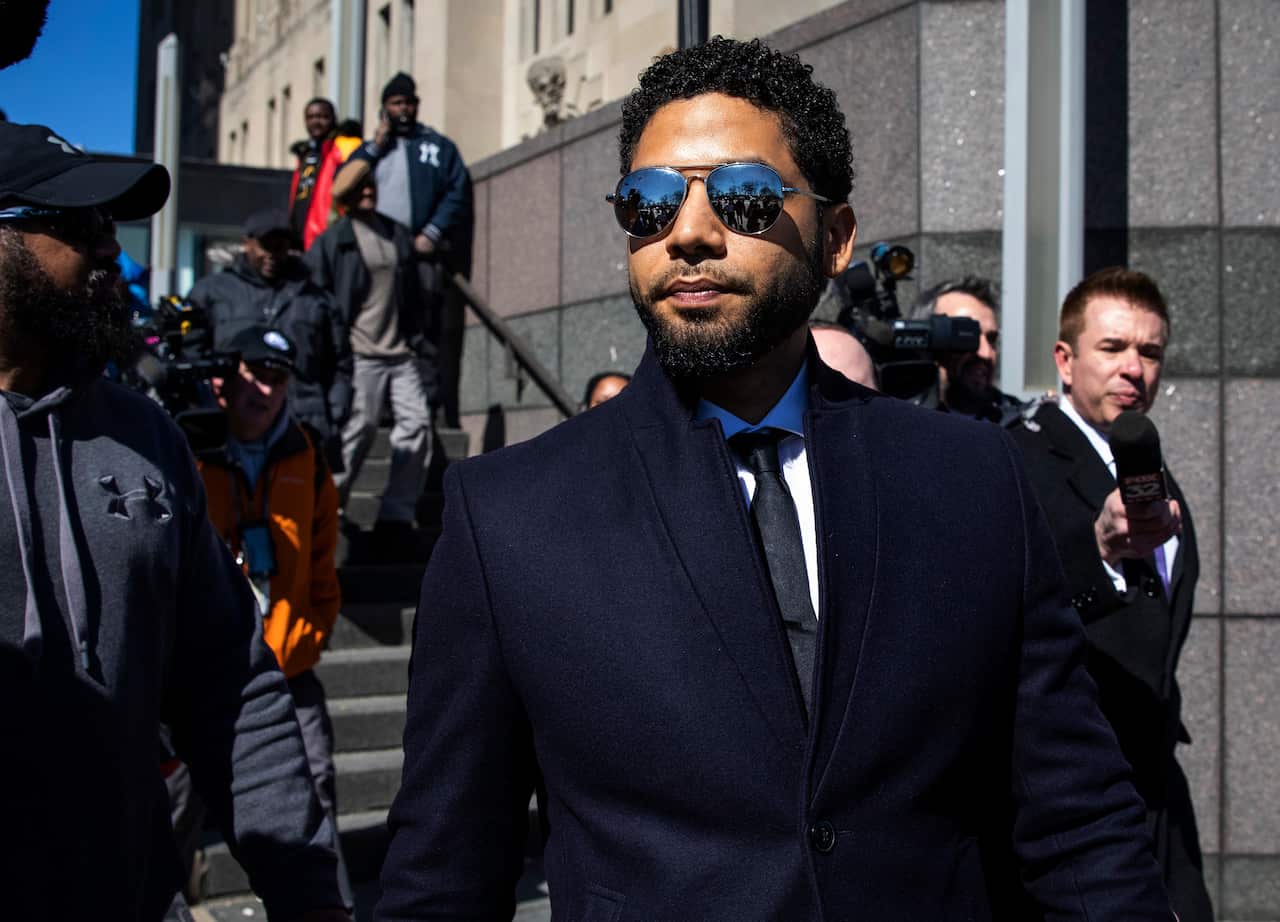 Actor Jussie Smollett leaves a Chicago courthouse last month after prosecutors dropped all charges against him.