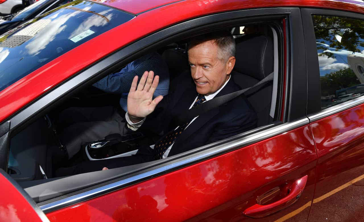 Leader of the Opposition Bill Shorten leaves in an electric car after launching Labor's Climate Change Action Plan at the Actewagl Electric Car Charging Station in Canberra, Monday, April 1, 2019. (AAP Image/Mick Tsikas) NO ARCHIVING