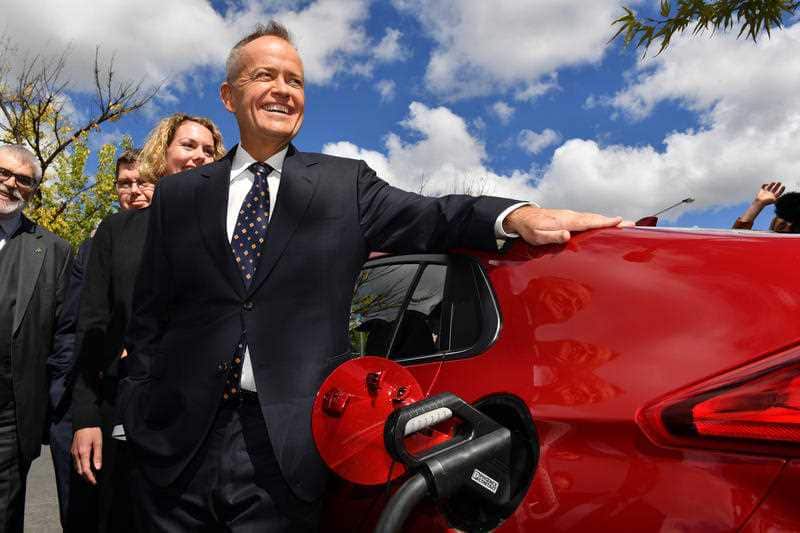 Leader of the Opposition Bill Shorten charges an electric car after launching Labor's Climate Change Action Plan.