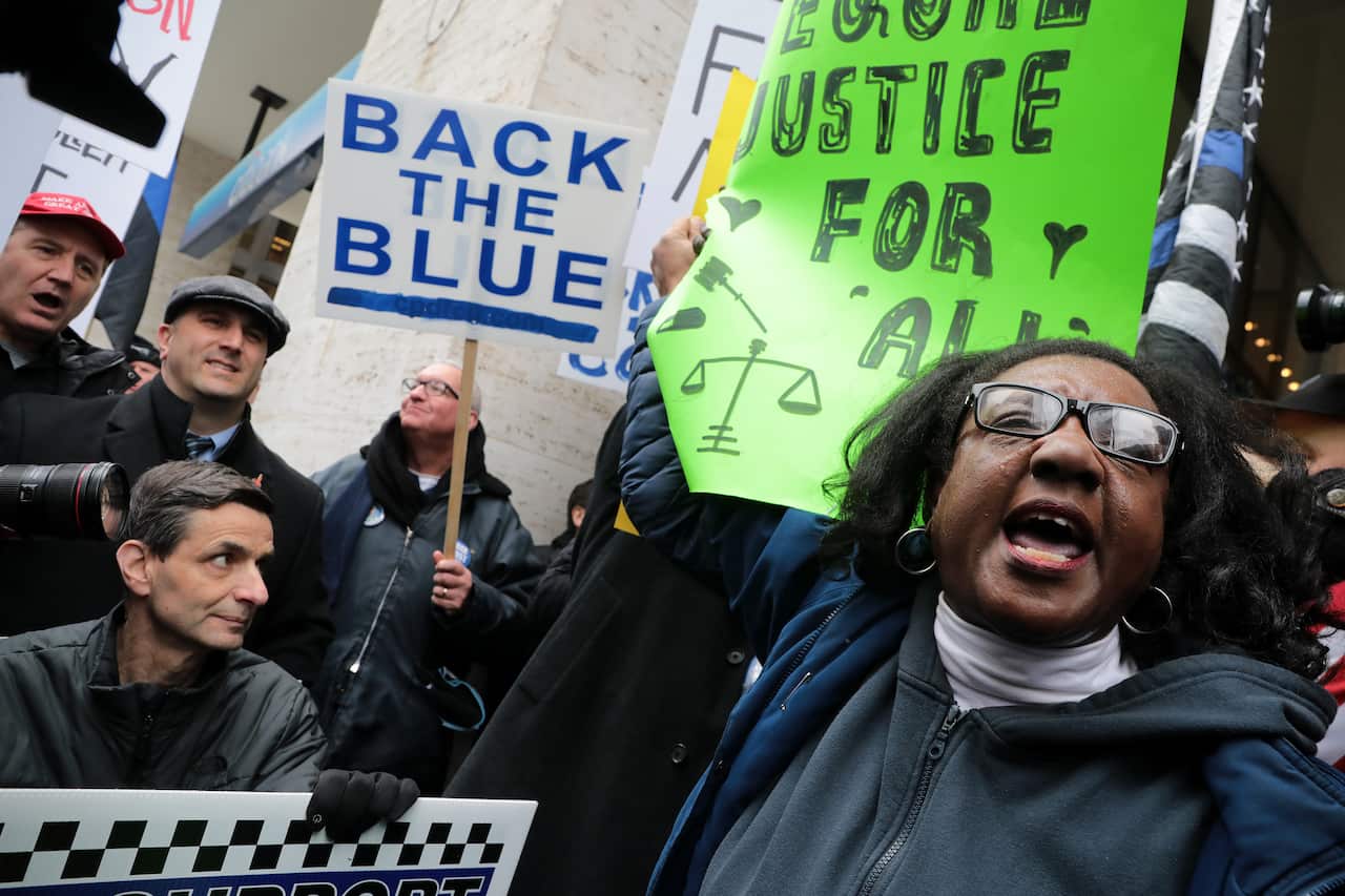 Dueling protests from the Fraternal Order of Police and Chicago Alliance Against Racist and Political Repression.