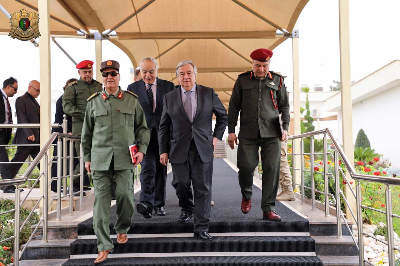 UN Secretary-General Antonio Guterres (C-R) and Special Representative of the Secretary-General and Head of UNSMIL Ghassan Salame (C-L).