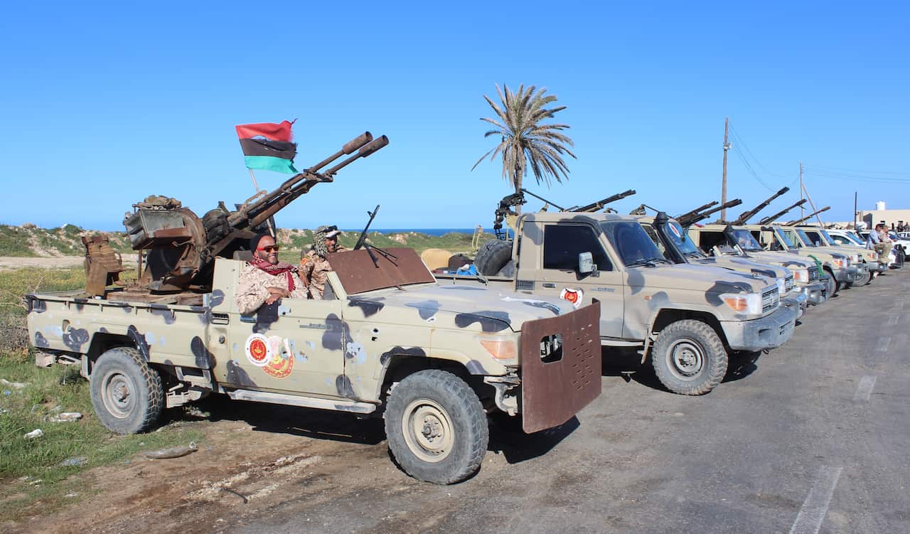 Vehicles and militants, reportedly from the Misrata militia, gather to join Tripoli forces, in Tripoli, Libya.