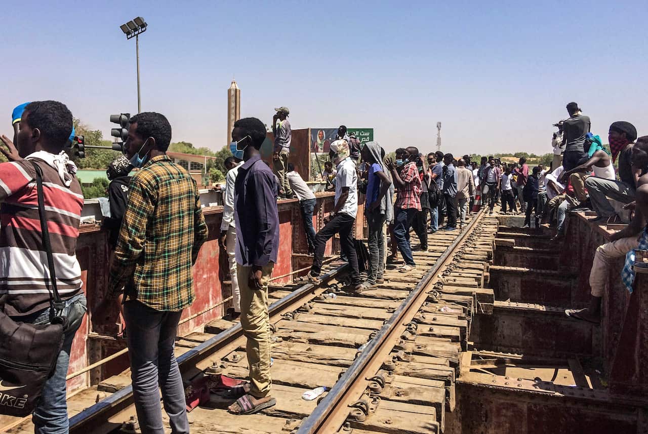 Sudanese protesters gather near the military headquarters on Sunday, April 7 in the capital Khartoum, Sudan. 