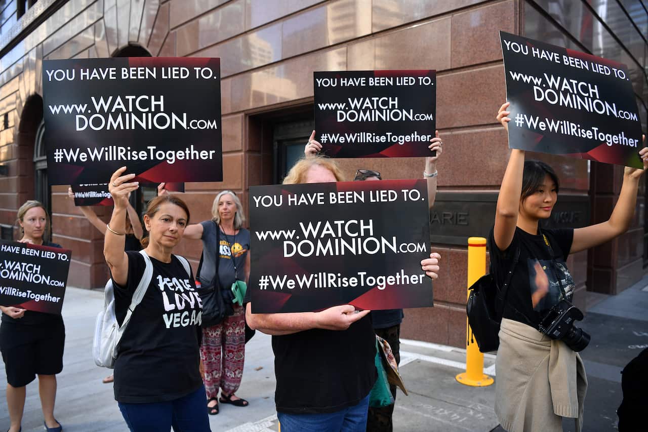 Animal rights protesters march through the business district in Sydney last Monday