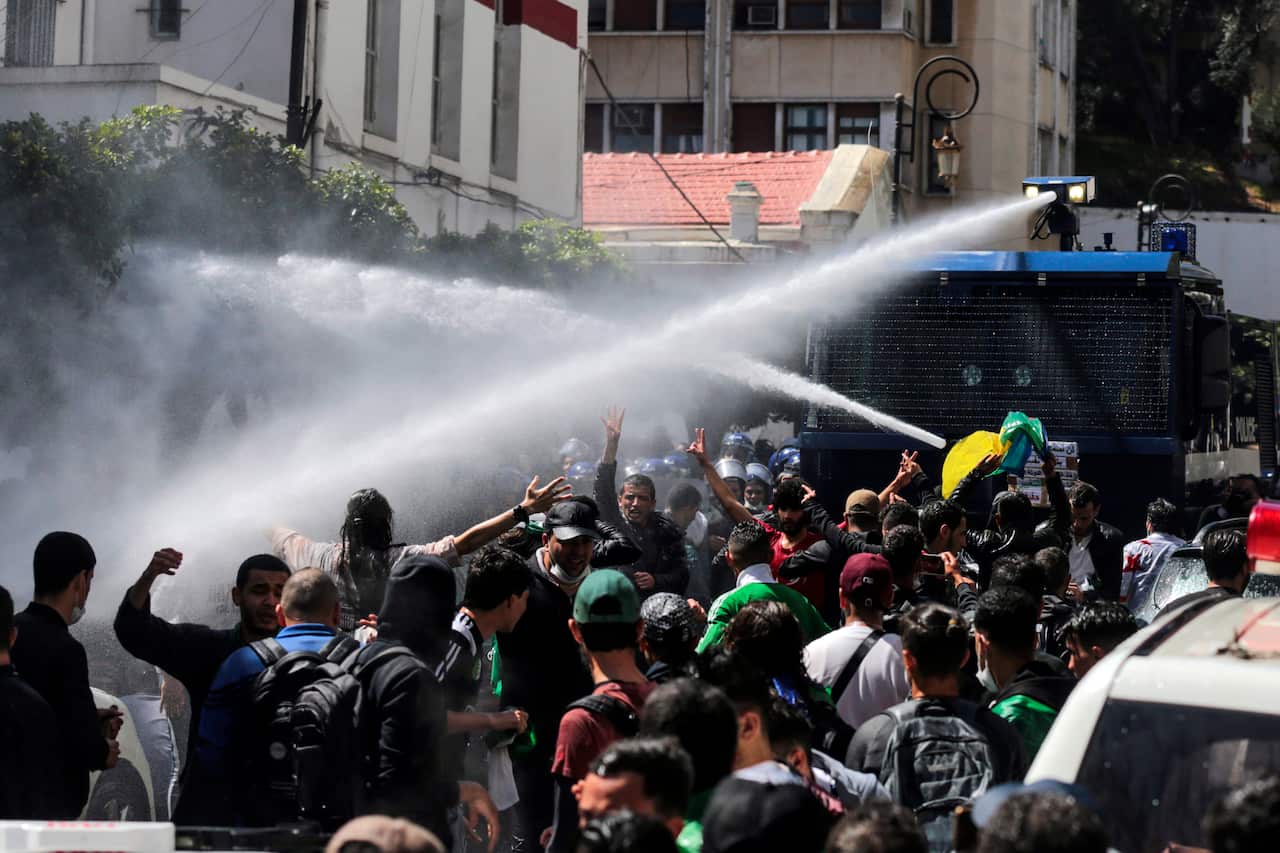 Police uses water cannon to disperse a demonstration for students in Algiers, Algeria.