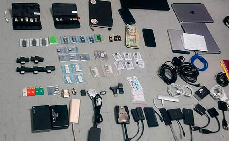 A handout photo shows items which were obtained in the raid on Ola Bini's house.