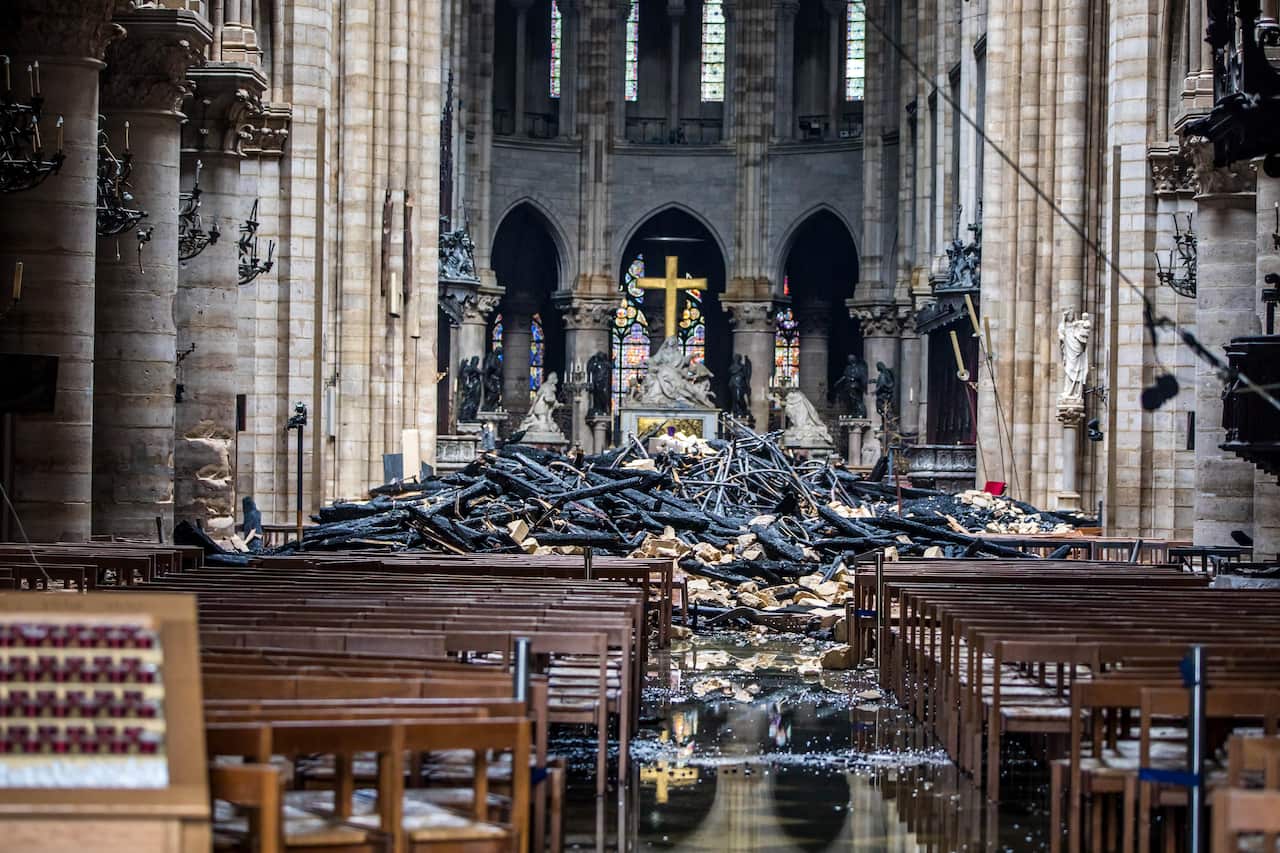 Debris is seen inside the damaged Notre Dame cathedral in Paris.