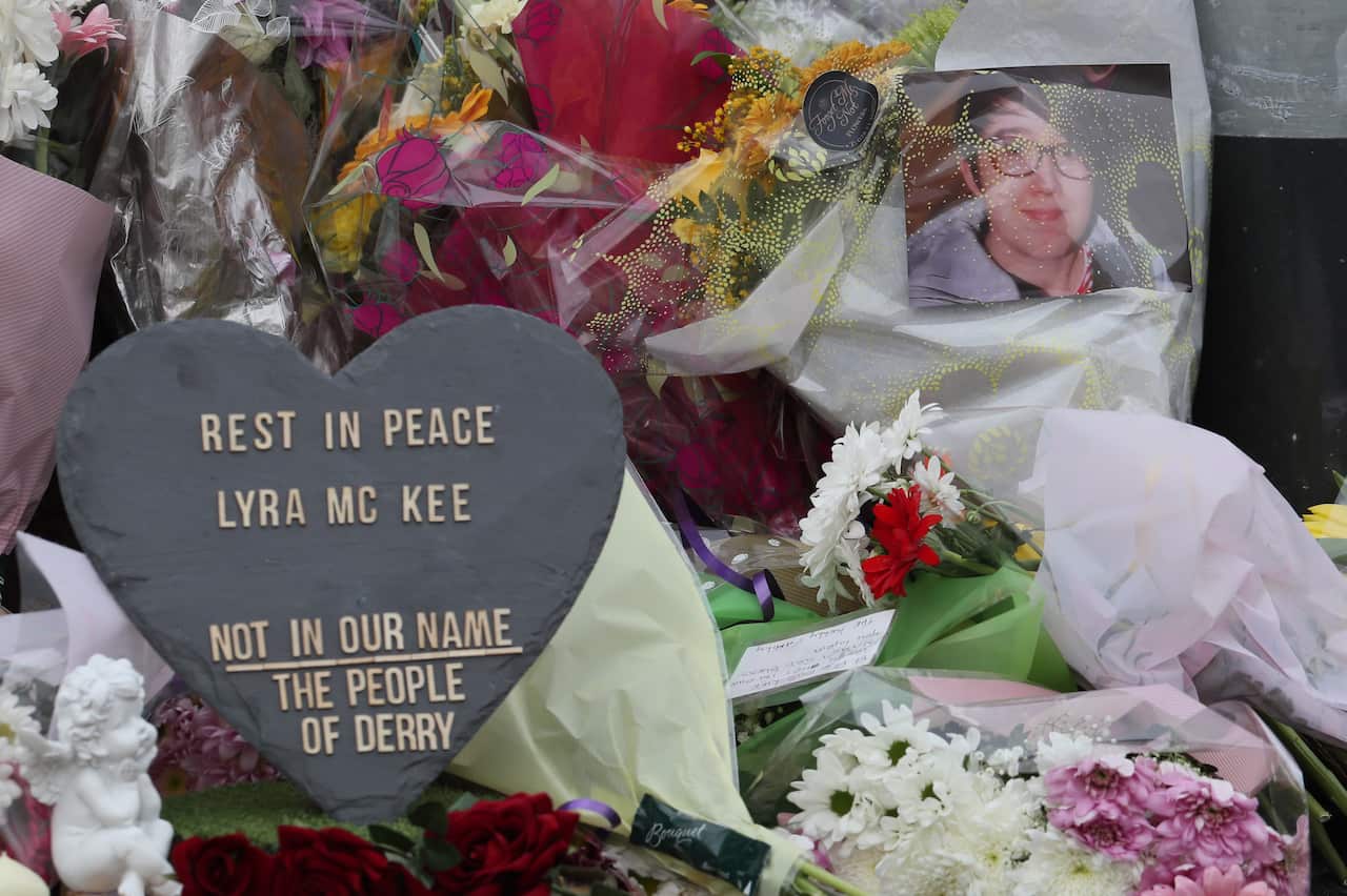 Flowers are left at the scene where 29-year-old journalist Lyra McKee was shot in Londonderry, Northern Ireland.