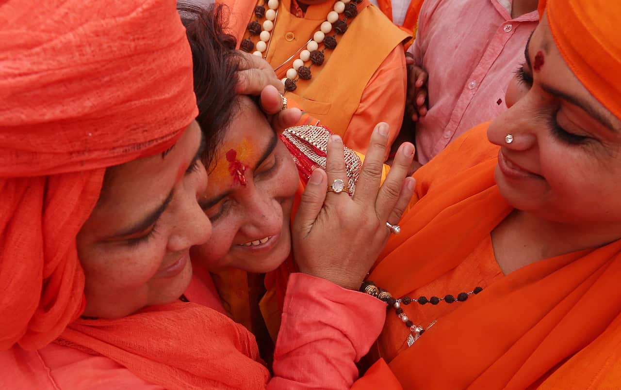 Pragya Singh Thakur being greeted by her supporters.