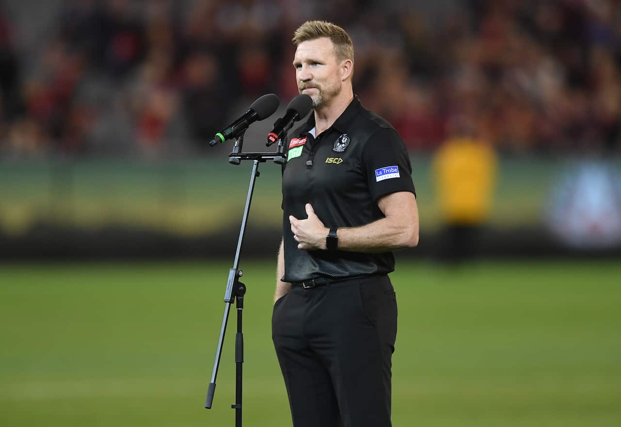 Magpies coach Nathan Buckley is seen as he makes a speech after the Round 6 AFL match between the Essendon Bombers and the Collingwood Magpies at the MCG in Melbourne, Thursday, April 25, 2019. (AAP Image/Julian Smith) NO ARCHIVING, EDITORIAL USE ONLY