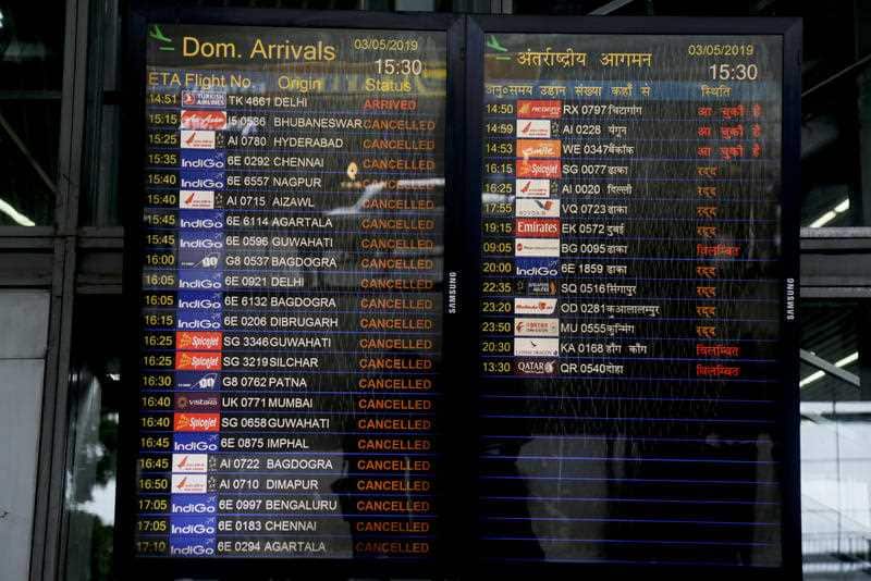 Electronic display boards flash cancelled flights outside the Netaji Subhas Chandra Bose international airport.