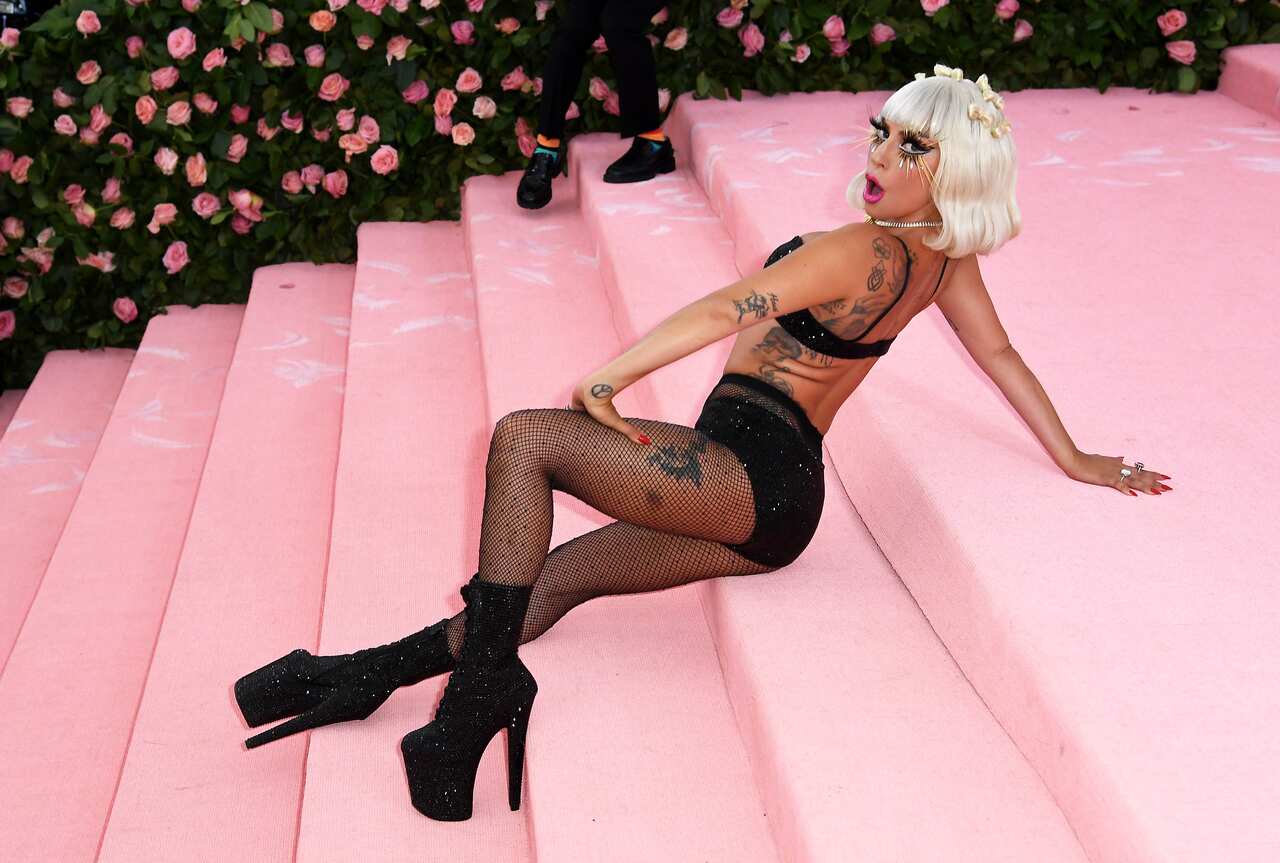 Lady Gaga's stripped three layers to reveal her final costume at this year's Met Gala.