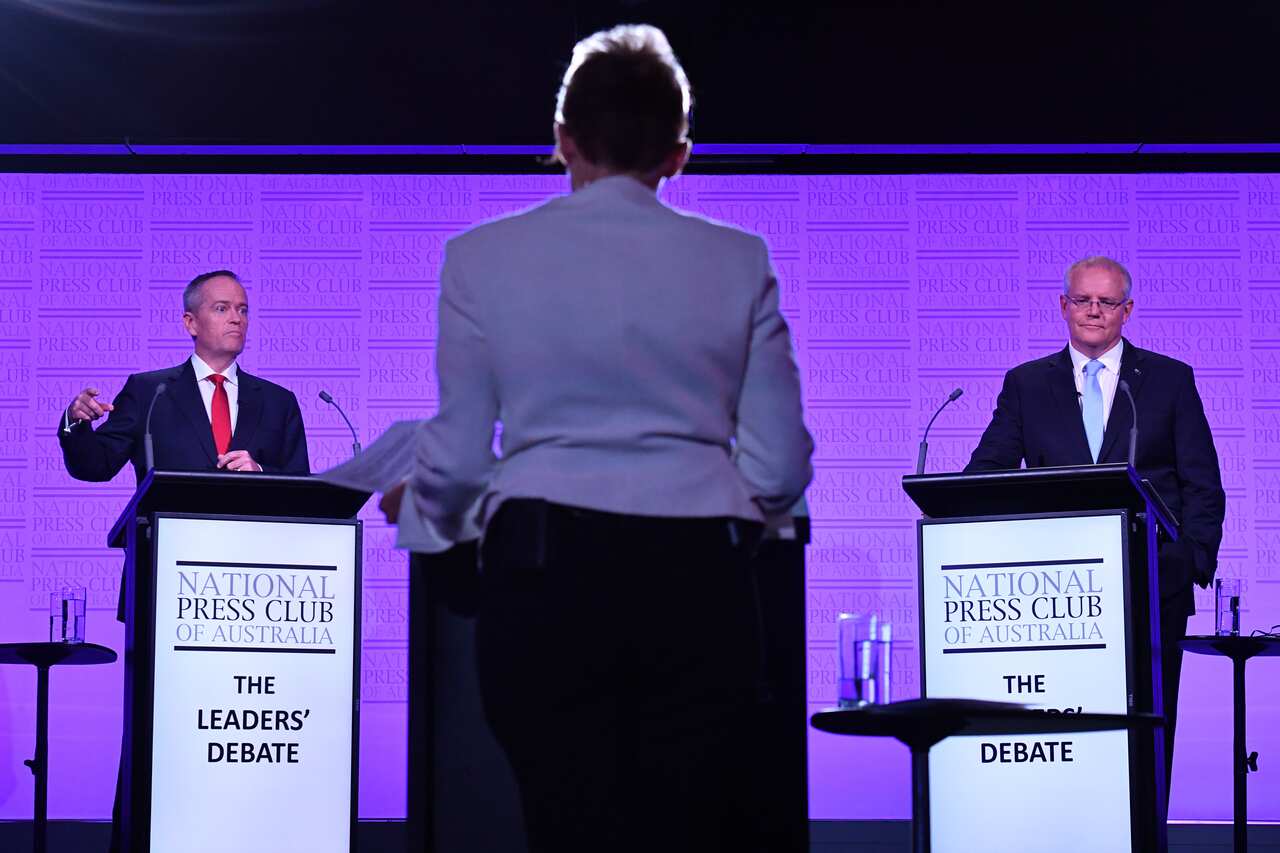 Leader of the Opposition Bill Shorten and Prime Minister Scott Morrison during the third Leaders Debate at the National Press Club in Canberra, Wednesday, May 8, 2019. (AAP Image/Mick Tsikas) NO ARCHIVING