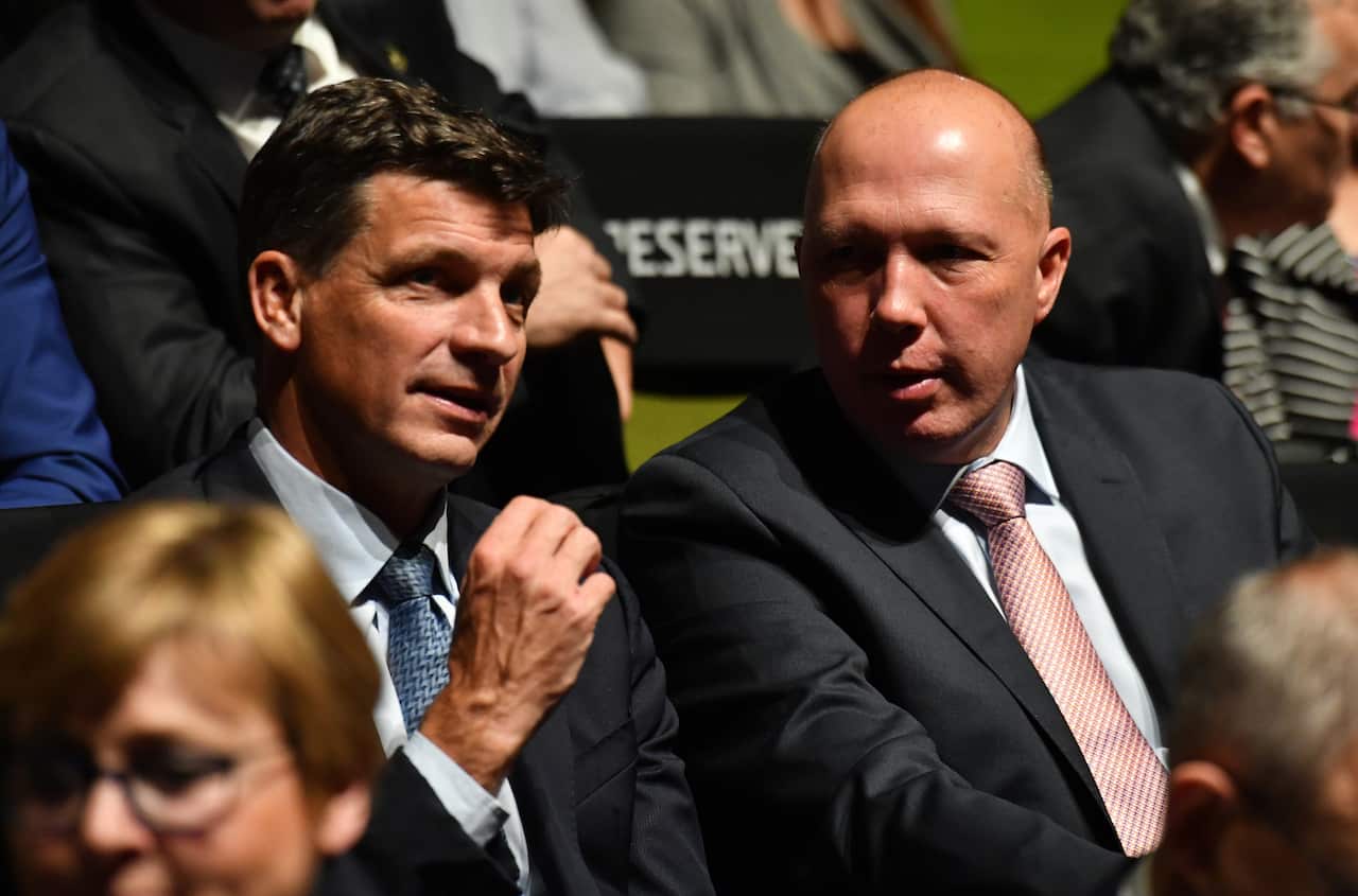 Minister for Energy Angus Taylor and Minister for Home Affairs Peter Dutton during the Liberal Party campaign launch for the 2019 Federal election at the Melbourne Convention Centre in Melbourne, Sunday, May 12, 2019. (AAP Image/Mick Tsikas) NO ARCHIVING
